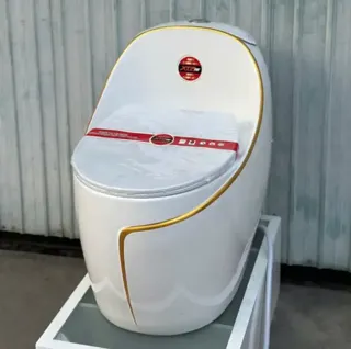 Hình ảnh Bồn Cầu Một Khối Hình Trứng Trắng Bóng Viền Vàng | Thiết Bị Vệ Sinh Bình Dương